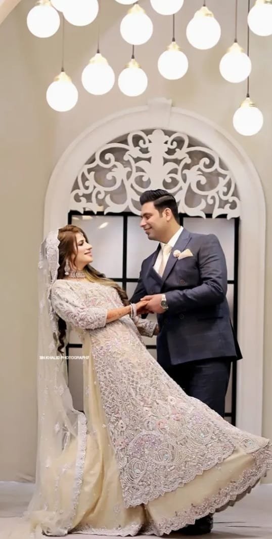 Bride and groom sharing a quiet moment at their wedding venue