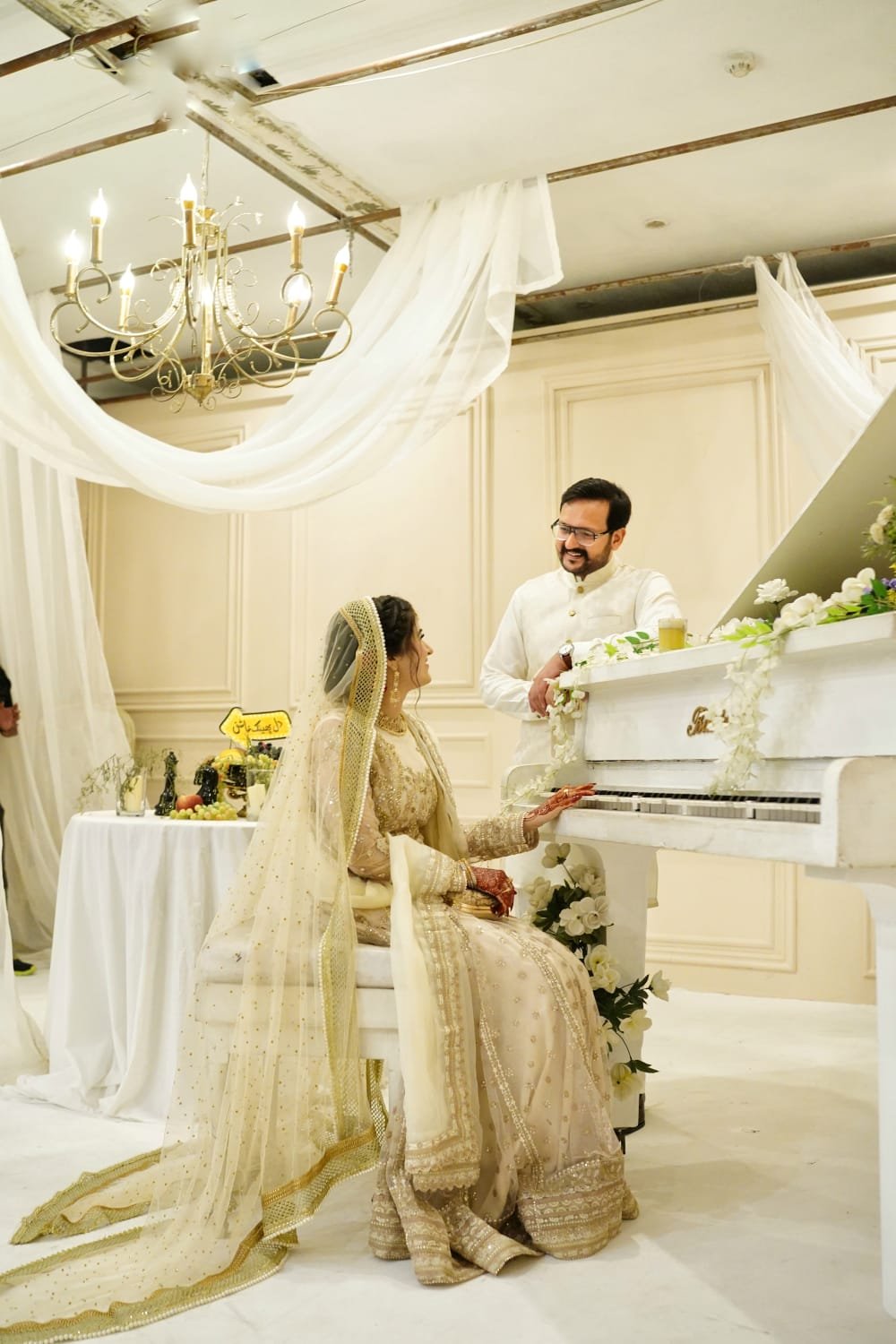 Traditional wedding portrait with a mirror reflection